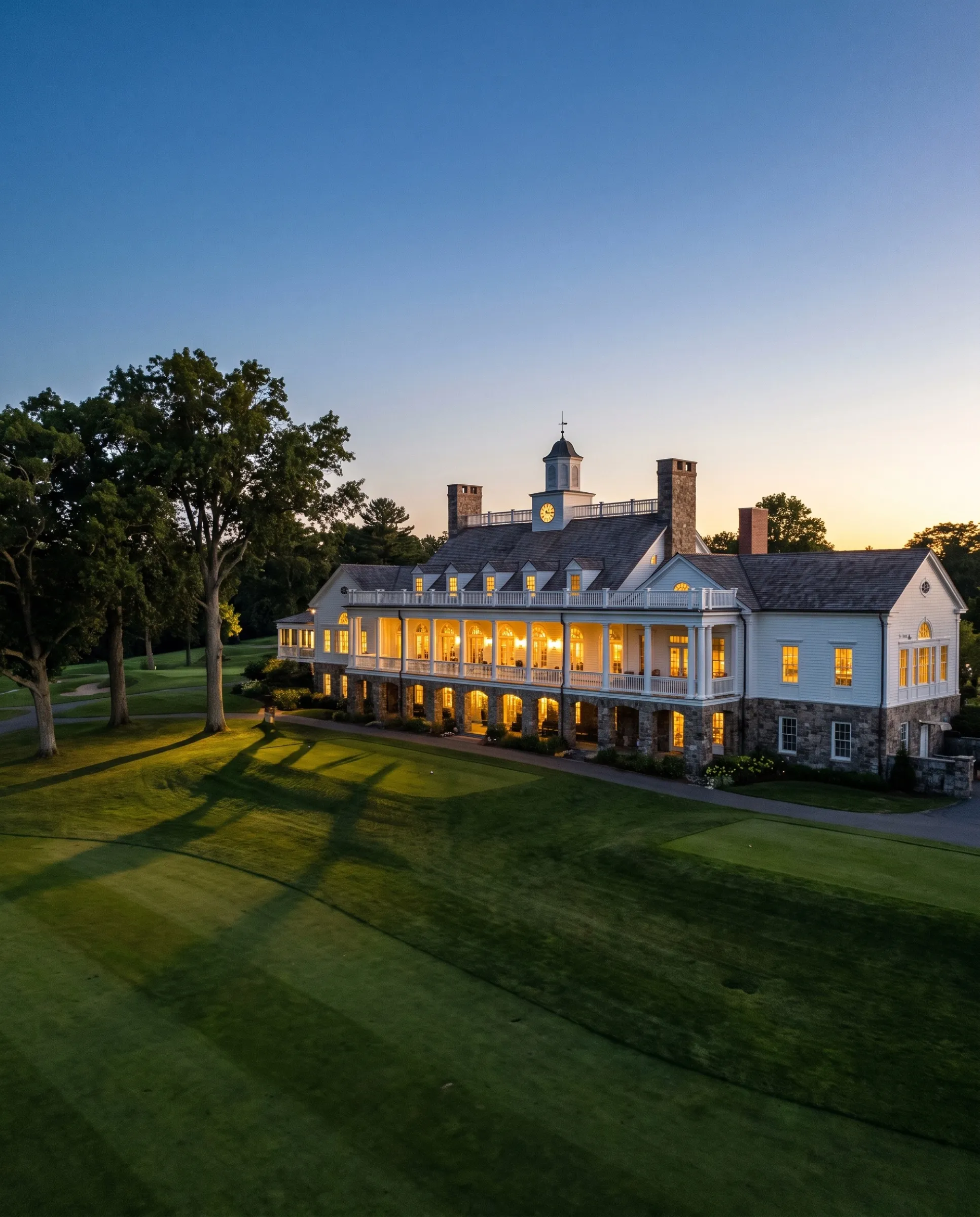 A country club clubhouse at dusk